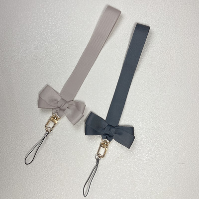 Bowknot mobiltelefon lánc medál univerzális kézszíj ajándék gyermekbarátoknak USB jelvény kulcstartó csuklópánt
