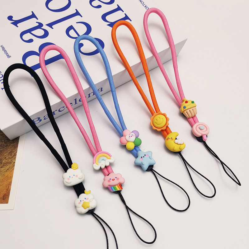 Κοντό μενταγιόν καρπού κινούμενα σχέδια Χαριτωμένο υφαντό κρεμαστό μενταγιόν καρπού κορδόνι τηλεφώνου κατά της απώλειας Ρυθμιζόμενο αποσπώμενο λουρί Κορδόνι κινητού τηλεφώνου