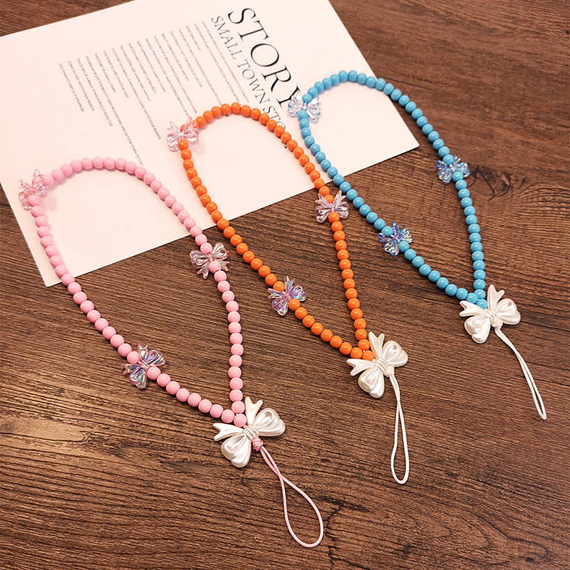 Rövid, kézi gyöngyökkel díszített kreatív masni színes gyöngyök medál telefon elvesztést gátló csuklópánt Kézi medál mobiltelefon zsinór