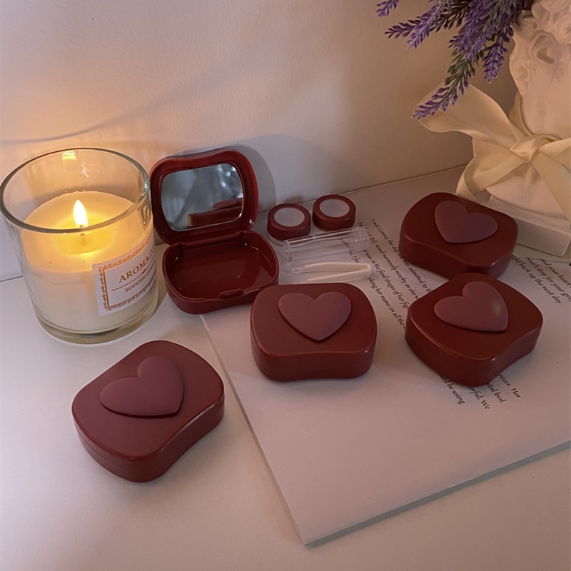 Egyszerű kontaktlencse-tok, szív kialakítású utazólencsedoboz-készlet tükörszem-lencsetartó-tartállyal kozmetikai kontaktlencséhez