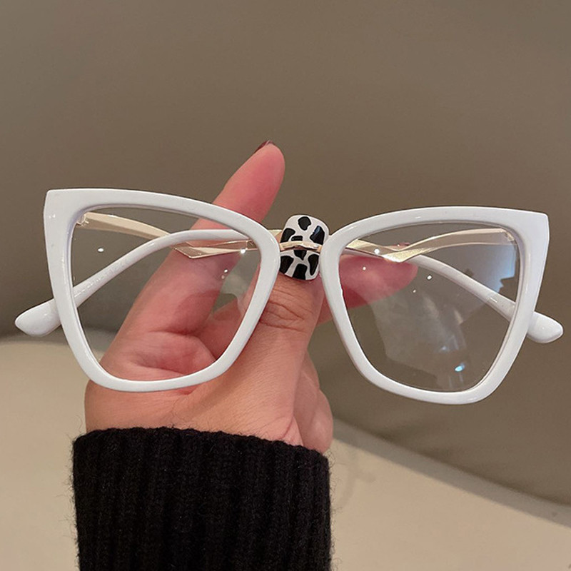 Jedinstvene anti-plave svjetleće mačkaste naočale za žene Nova moda Aluminijski okvir za računalne naočale sa savijenim nogama Ženske elegantne nijanse