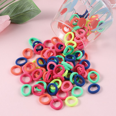 100 τμχ Παιδικό μικρό δαχτυλίδι μαλλιών για κορίτσια Χαριτωμένα γλυκά αξεσουάρ μαλλιών Πολύχρωμα λάστιχα υψηλής ελαστικότητας δώρο κορδέλα