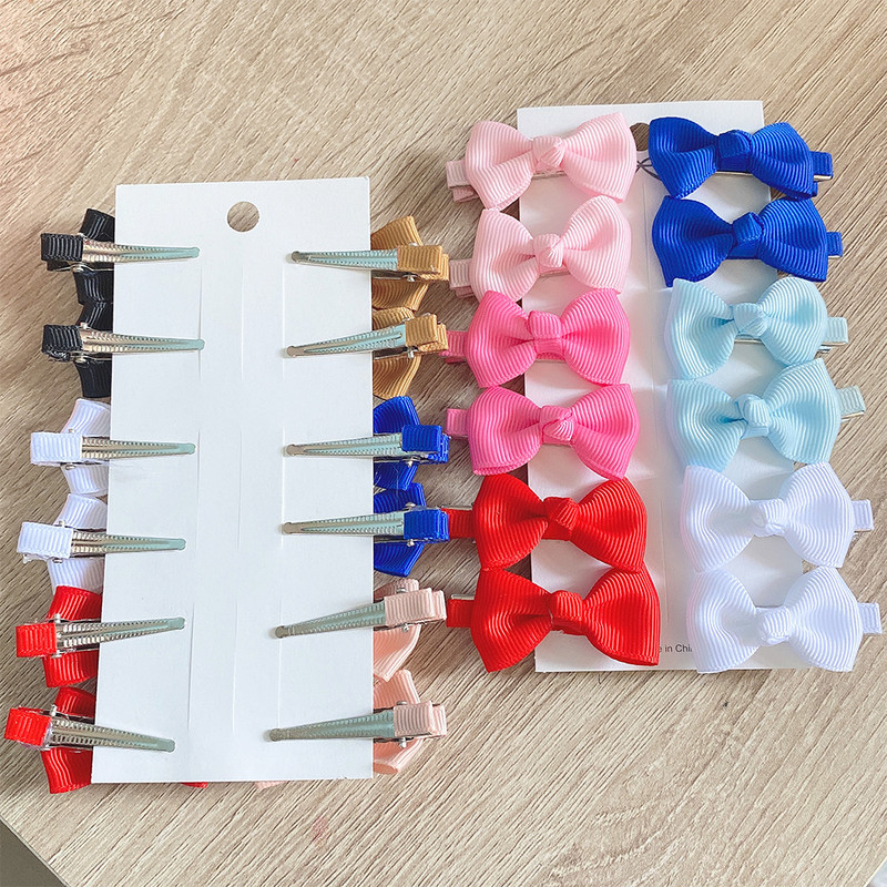 12 vienetų / partijoje Solid Grosgrain Ribbon MiNi Plaukų lankeliai Plaukų segtukai Vaikams Mieli Mergaičių plaukų segtukai Nauji galvos apdangalai Vaikiški Plaukų Priedai