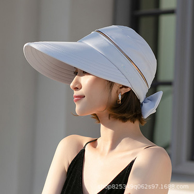 Șapcă detașabilă la modă pentru femei. Cape de sus goale pentru femei. Pălărie de soare cu fermoar.