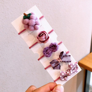 Őszi és téli új gyapjú filc öltöny Gyerek fejfedő Rajzfilm táska kis gumiszalag masni csomó haj kötél