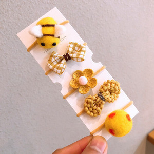 Őszi és téli új gyapjú filc öltöny Gyerek fejfedő Rajzfilm táska kis gumiszalag masni csomó haj kötél