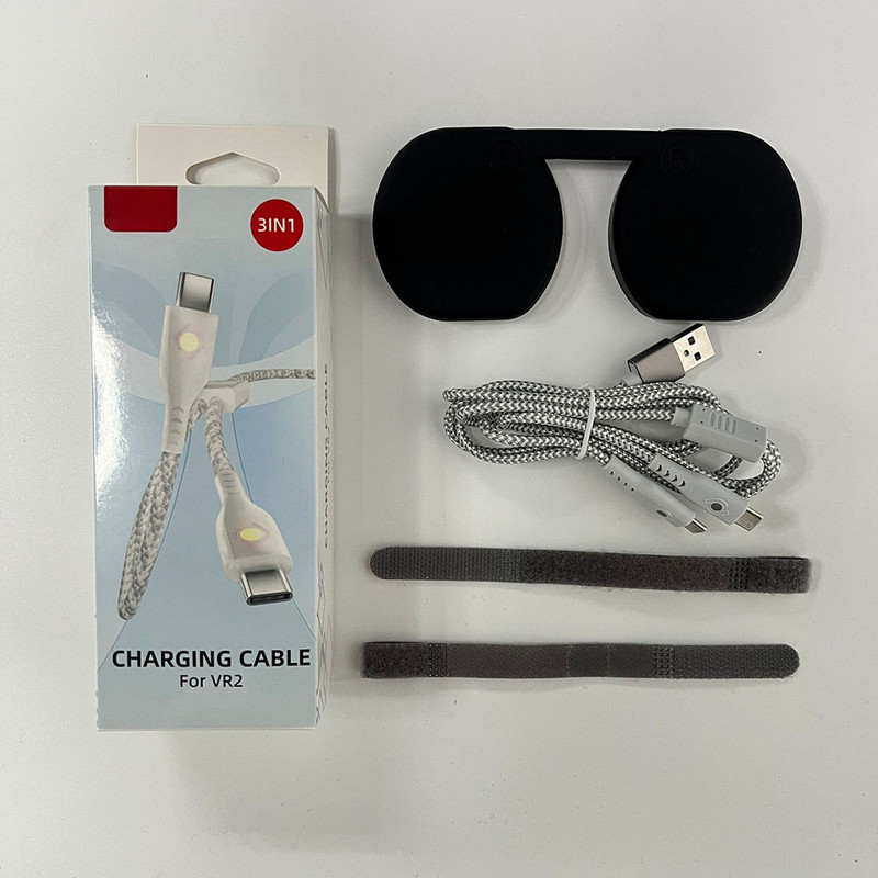 Mini kabel za punjenje s kontrolnom lampicom podijeljen u dva kabela za punjenje, zaštitni poklopac, čarobna traka za PS VR2, ručka, VR dodaci
