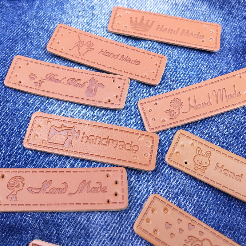 20 tk/pakk PU-nahast sildid Tee isetehtud sildid Käsitsi valmistatud kirjamustriga ristkülikukujuline reljeefne silt rõivaste rõivaste mütsi õmblustarvikute jaoks