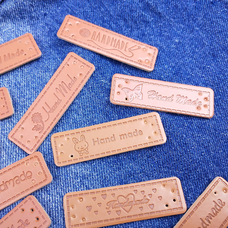 20 tk/pakk PU-nahast sildid Tee isetehtud sildid Käsitsi valmistatud kirjamustriga ristkülikukujuline reljeefne silt rõivaste rõivaste mütsi õmblustarvikute jaoks