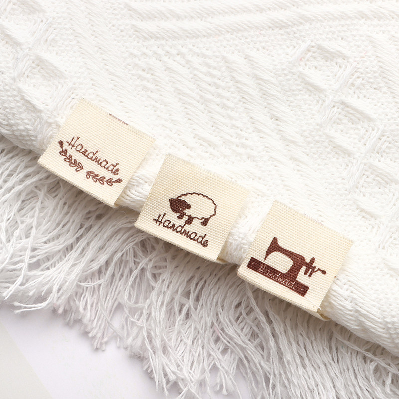 50kom platnenih naljepnica Ručno izrađene naljepnice Preklopne naljepnice s uzorkom ovčjeg srca Ručno izrađene naljepnice za pletene kape Otisnuti pribor za šivanje