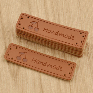 50 vnt Personality Mutli modelio siuvimo rankų darbo PU odos etiketės drabužių maišelio rankdarbiams dekoruoti