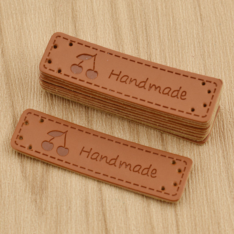 50 vnt Personality Mutli modelio siuvimo rankų darbo PU odos etiketės drabužių maišelio rankdarbiams dekoruoti