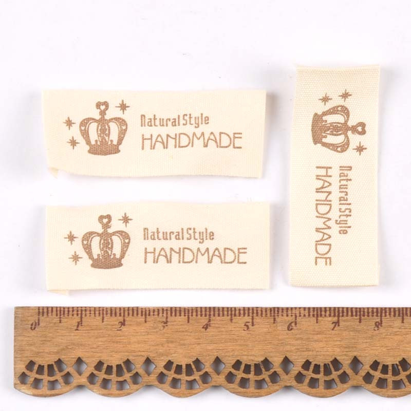 50 komada mješovitih bež ručno tiskanih pamučno tkanih naljepnica za naljepnicu za njegu odjeće, perivih odjevnih oznaka, pribora za šivanje c2395