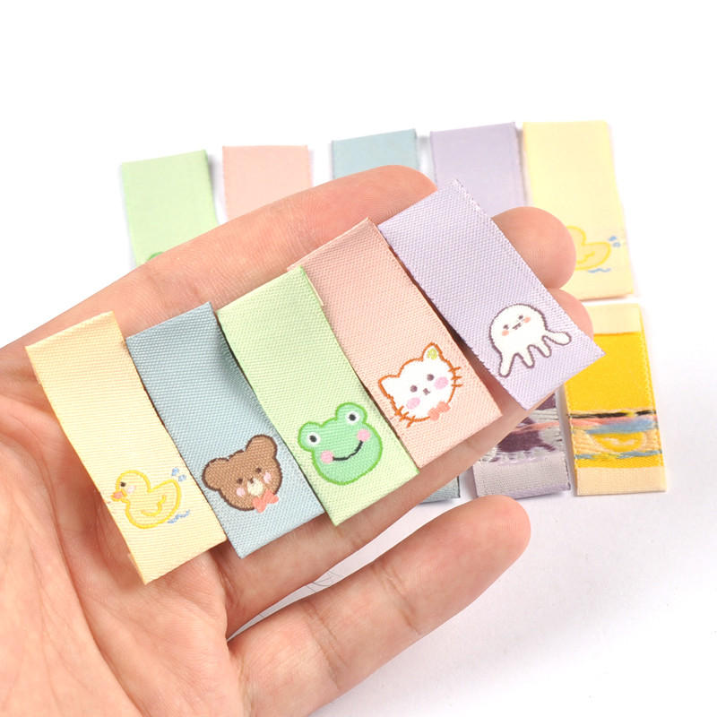 50gab. jauktas multfilmas dzīvnieki Izšūšanas etiķetes apģērba šūšanai, rokām darināti aksesuāri, apģērbi, etiķetes, kopšanas somas Logotips.