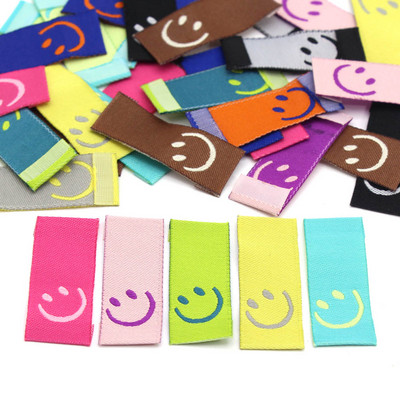 50 db Smile kézzel készített címkék cukorka színes pamut ruhák címkék hímzés kézzel készített címkék babaruhákhoz ruházati kiegészítők