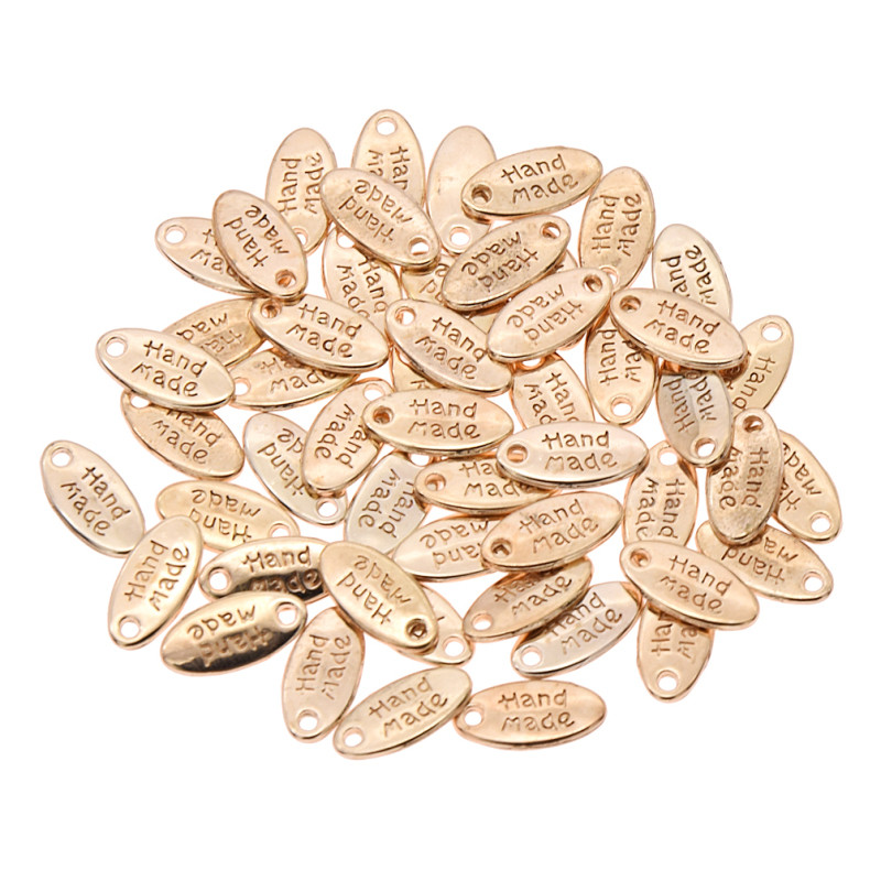 50 tk Käsitööna valmistatud käsitöörõivaste kaunistus metallist siltide jaoks DIY õmblemine naiste kotid Sildid Aksessuaarid Tarvikud