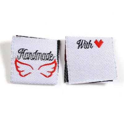 100 komada Ručno izrađeno s ljubavnim oznakama Pravokutni uzorak krila Poliesterske sklopive platnene naljepnice za pletene šešire Tkana oznaka za šivanje odjeće