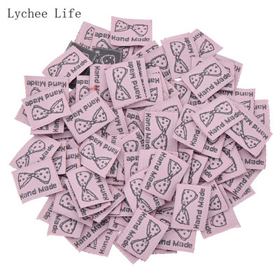 100 db Kézzel készített vászoncímkék Nyomtatott, kézzel készített szeretettel ruhacímkék Címkék ruhatáskákhoz barkács varróanyagok