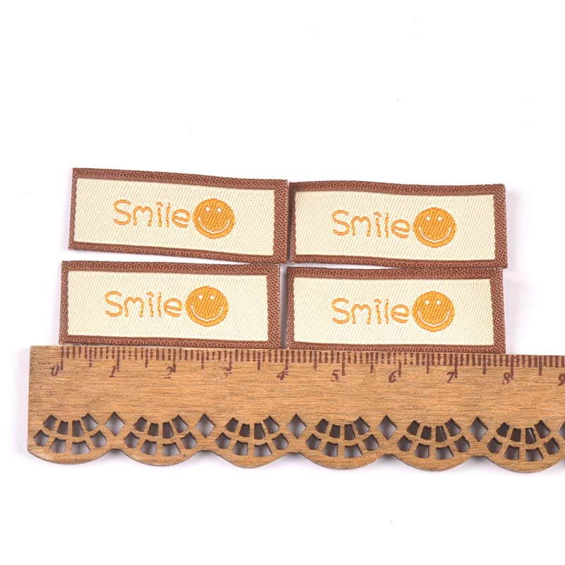 50 komada mješovitih uzoraka osmijeha Etikete za vezenje za šivanje odjeće Ručno izrađeni dodaci Oznake za odjeću Torbe za njegu Logo DIY C3207