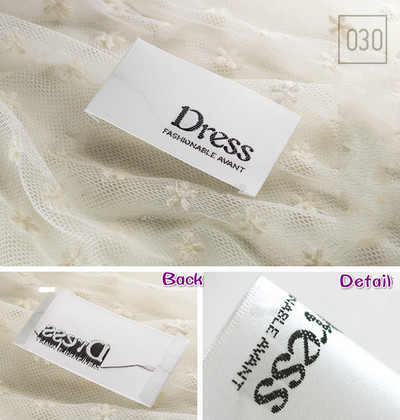 Vysokokvalitné čiernobiele šaty s logom, drevený kyvadlový materiál, oblečenie, odev, tkané štítky, koncový priečinok