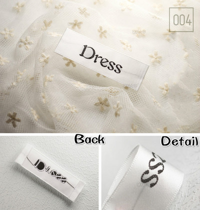 Vysokokvalitné čiernobiele šaty s logom, drevený kyvadlový materiál, oblečenie, odev, tkané štítky, koncový priečinok