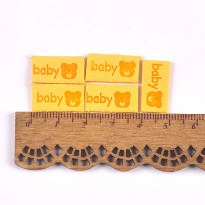 50 db Többszínű dombornyomott bőr baba mackó címkék barkács kézműves ruha kellékek varrás kiegészítők ruha sapkák cipő címkék