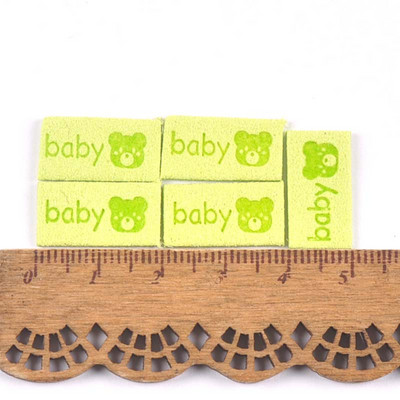 50 db Többszínű dombornyomott bőr baba mackó címkék barkács kézműves ruha kellékek varrás kiegészítők ruha sapkák cipő címkék