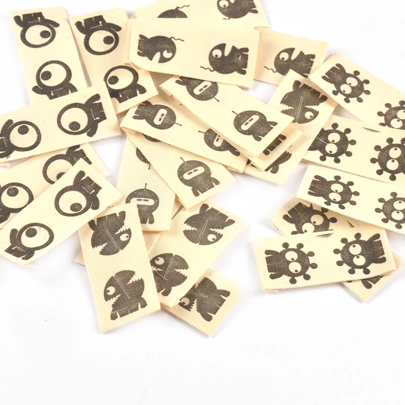 50 komada mješovitih crtanih tiskanih bež naljepnica za djecu Dodaci za šivanje DIY šeširi Torbe Rukotvorine Oznake odjeće Ručno izrađeni pribor c3615
