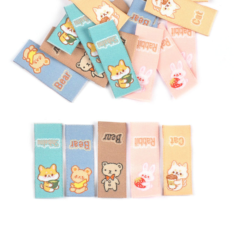 50db Vegyes nyúl/medve rajzfilm hímző címke varrás kiegészítők ruhatáskákhoz Mosható ápolócímke Kézzel készített barkács kézműves c3209