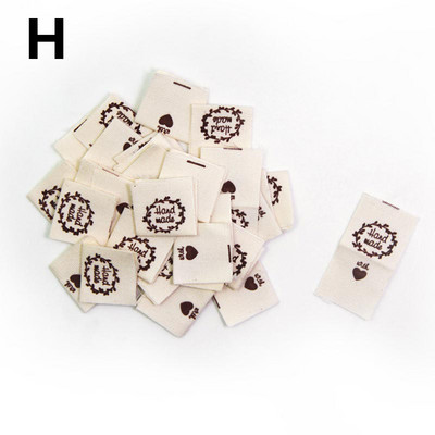 50 vnt. Drabužių etiketė Rankų darbo raidžių siuvimo etiketė miela animacinių filmų kepuraitė Amatininkų krepšys Marškinėliai Suknelė Drabužiai Drabužiai Etiketė