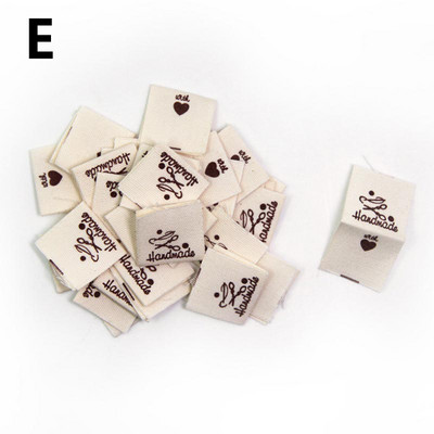 50 vnt. Drabužių etiketė Rankų darbo raidžių siuvimo etiketė miela animacinių filmų kepuraitė Amatininkų krepšys Marškinėliai Suknelė Drabužiai Drabužiai Etiketė