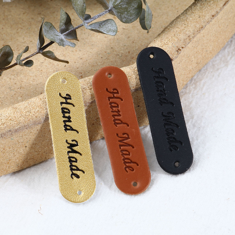 50PCS PU kožne ovalne etikete Oznake Ručno izrađene tiskane ručno izrađene kožne oznake Ručno izrađena odjeća Cipele Dodaci za šivanje 4.5x1.2cm