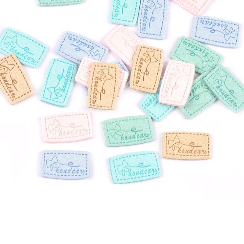 20 kom Mix Color Mašne Reljefne Flanelette Etikete DIY Rukotvorine Rukotvorine Dodaci za šivanje za odjeću Oznake za odjeću c3212