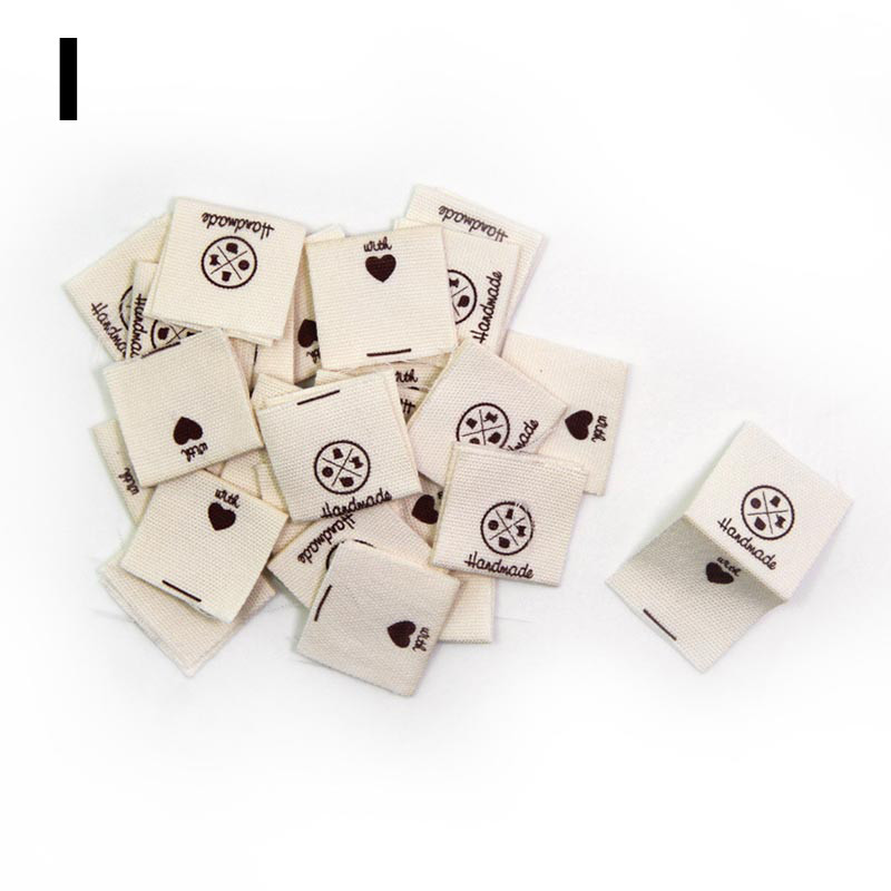 50kom platnenih naljepnica Ručno izrađene naljepnice na presavijanje Oznake s uzorkom ovčjeg srca Ručno izrađene naljepnice za pletene kape Otisnute pamučno tkane šivane oznake