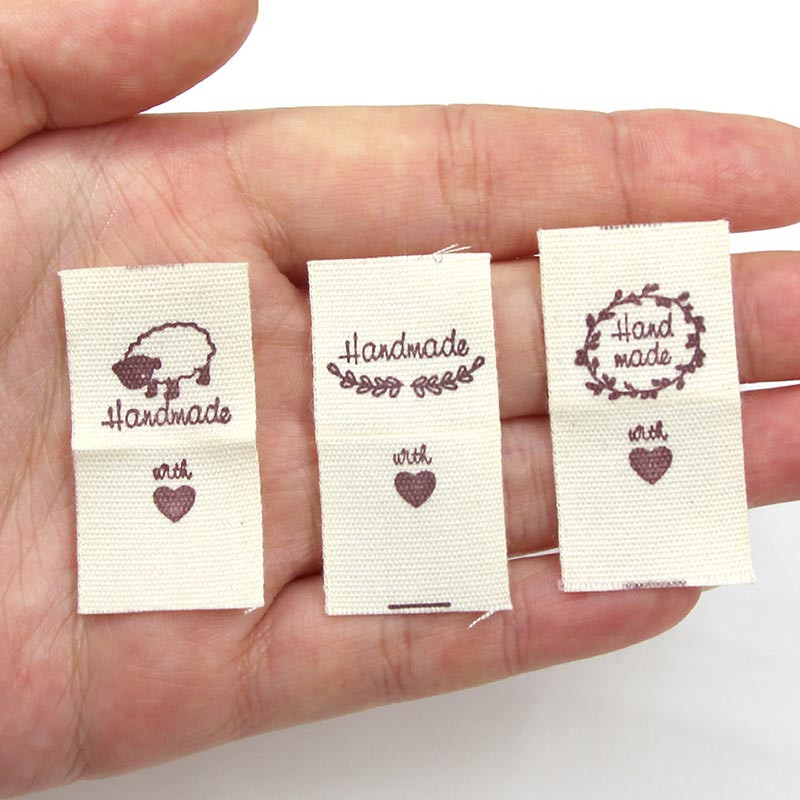 50kom platnenih naljepnica Ručno izrađene naljepnice na presavijanje Oznake s uzorkom ovčjeg srca Ručno izrađene naljepnice za pletene kape Otisnute pamučno tkane šivane oznake