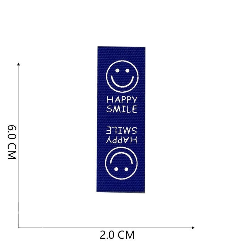 Naljepnice od tkanine Ručno izrađene naljepnice Preklopne oznake Uzorak osmijeha Ručno izrađene naljepnice za pletene kape Otisnute pamučno tkane šivane oznake 22120101