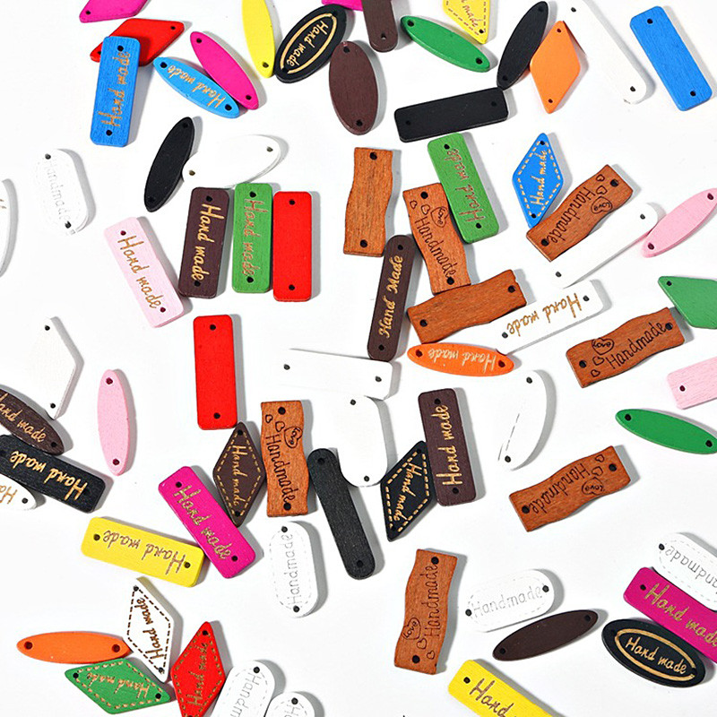 50 komada 2 rupe Geometrijski drveni gumbi sa znakovima prikladni za šivanje i albume DIY šeširi Torbe za odjeću Dodaci za šivanje