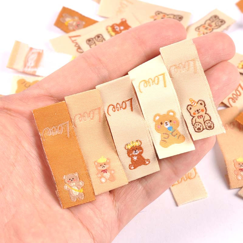 50kom Love Bear Vez Smeđe naljepnice za pribor za šivanje Torbe za njegu Oznake za odjeću Dječja odjeća Ručno izrađene DIY rukotvorine C2902