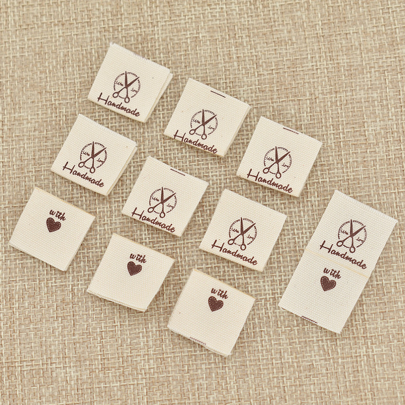 200 komada crtanog šivaćeg stroja s mačjim ručnim uzorkom s ljubavnom etiketom za DIY odjeću Šivanje na etiketama od pamuka