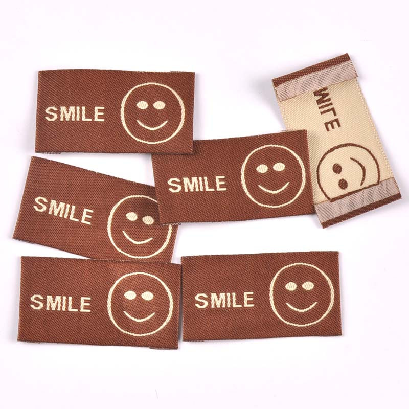 Mješoviti uzorak osmijeha 50 komada ručno izrađene tkane etikete za odjeću Etikete za šalove Cipele Torbe Oznake za odjeću 25x50 mm CP3525