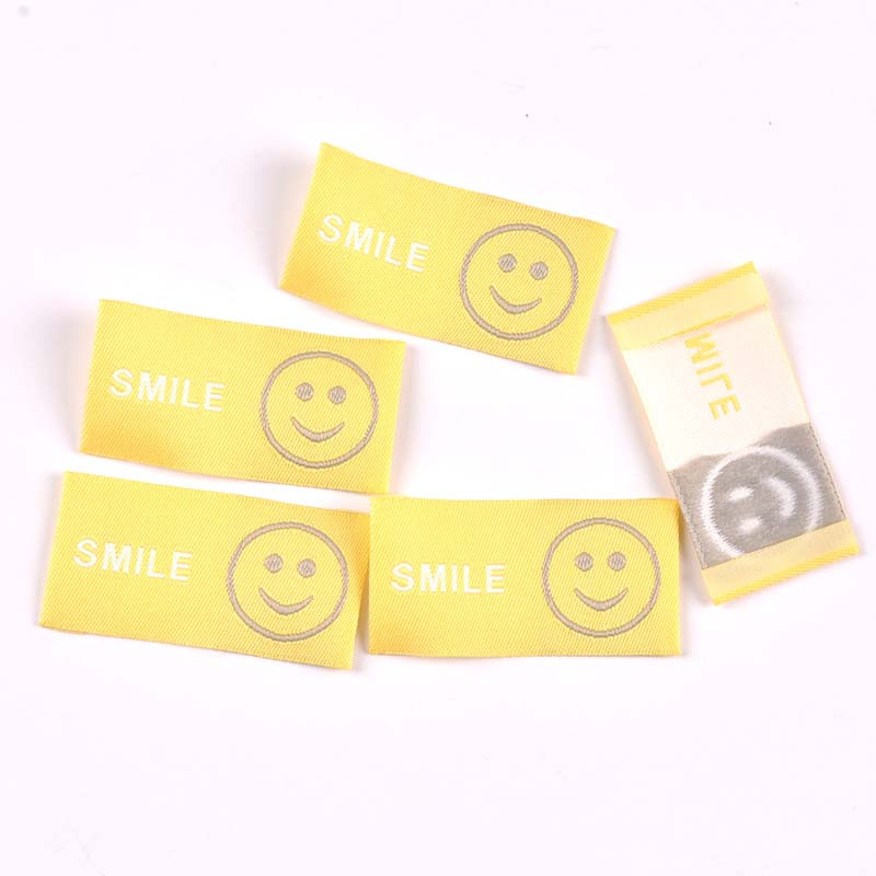 Mješoviti uzorak osmijeha 50 komada ručno izrađene tkane etikete za odjeću Etikete za šalove Cipele Torbe Oznake za odjeću 25x50 mm CP3525