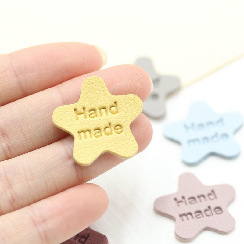 Ručne vyrobené štítky v tvare hviezdy na pletené čiapky, potlačené bavlnené tkané visačky na šitie 22112401