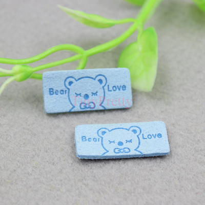 50 vnt. Minkštos dirbtinės odos reljefinės meškiuko meilės etiketės Drabužių etiketės Aksesuaras kūdikiui žieminės pirštinės, kepurės, nertos pirštinės