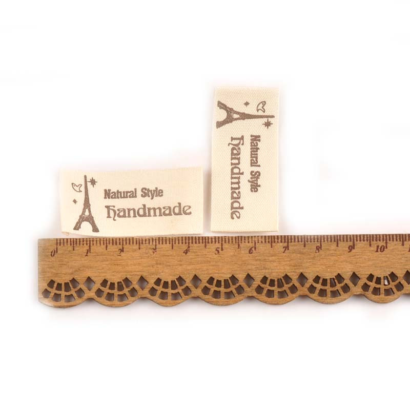 50db Bézs nyomtatott pamutszövet szőtt betűs címkék varráshoz ruhacímkék kézzel készített címkék ruhák barkács kézműves kiegészítők keveréke