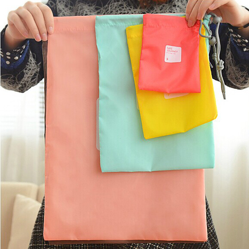 Fierbinte 4 bucăți / lot Genți de depozitare de călătorie rezistente la apă Organizator de machiaj pantofi de călătorie Geantă de rufe Lenjerie de corp Cosmetice Pachet de sortare