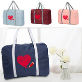 Sulankstomi kelioniniai krepšiai.