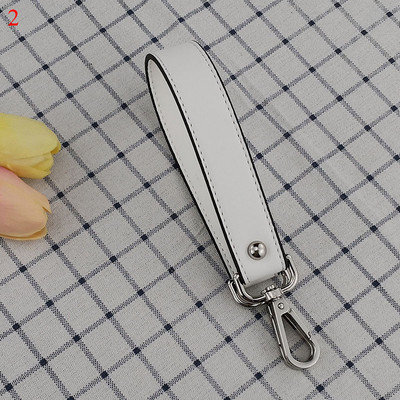 42 cm-es PU bőr kézitáskák rövid pántok divat csere szerpentin pántok színes fogantyús kiegészítők női vállövnek