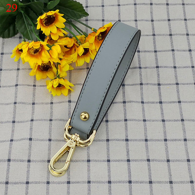 42 cm-es PU bőr kézitáskák rövid pántok divat csere szerpentin pántok színes fogantyús kiegészítők női vállövnek