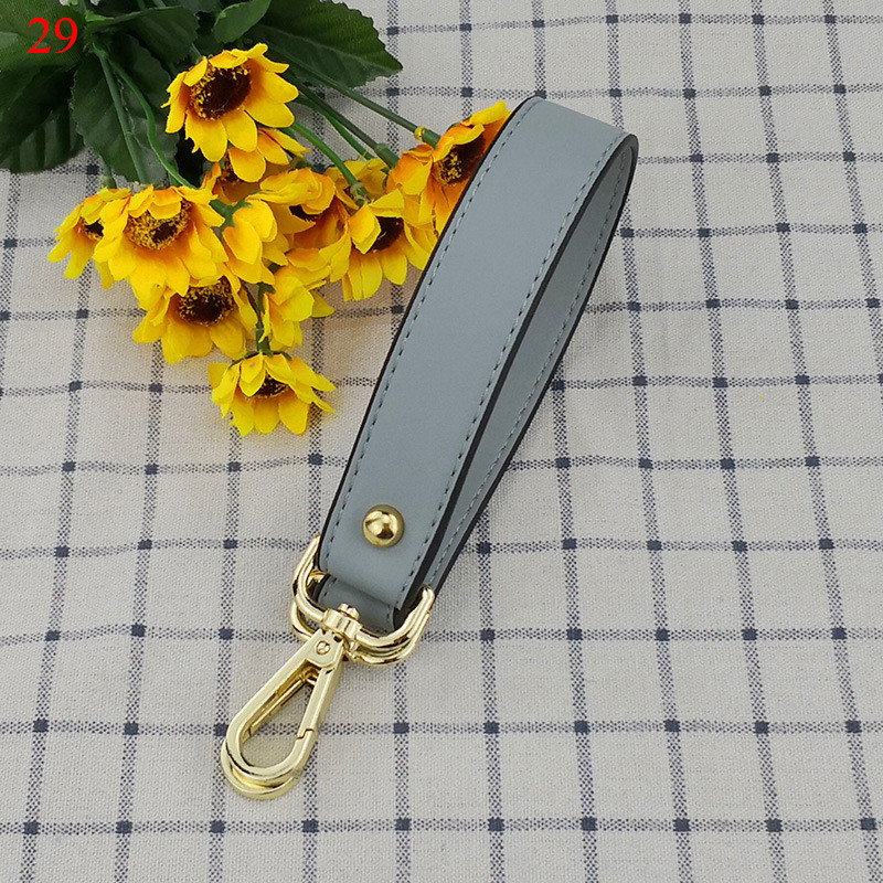 42 cm-es PU bőr kézitáskák rövid pántok divat csere szerpentin pántok színes fogantyús kiegészítők női vállövnek