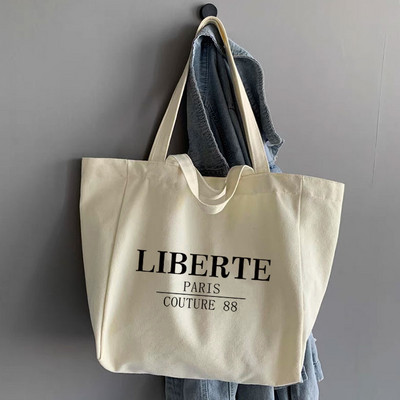 Iepirkumu somas Organizators Modes Audekla soma Studentu plecu somu teksta sērija Lielas ietilpības rokassomas sievietēm 2022. gads